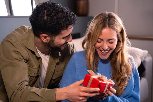 Man giving woman a present