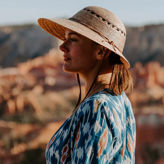 woman wearing Tula Sun hat in utah