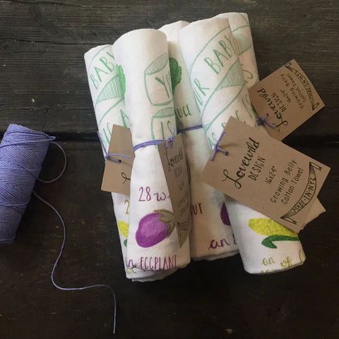 kitchen towels rolled with twine and note attached