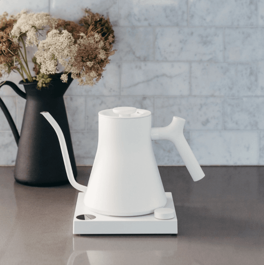 White electric tea kettle on counter