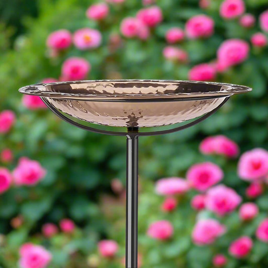 solid copper bird bath on steel stand