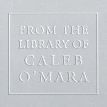 from the library of caleb omara embossed on a page