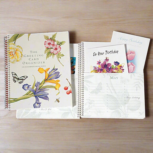 notebook to organize cards and note special dates