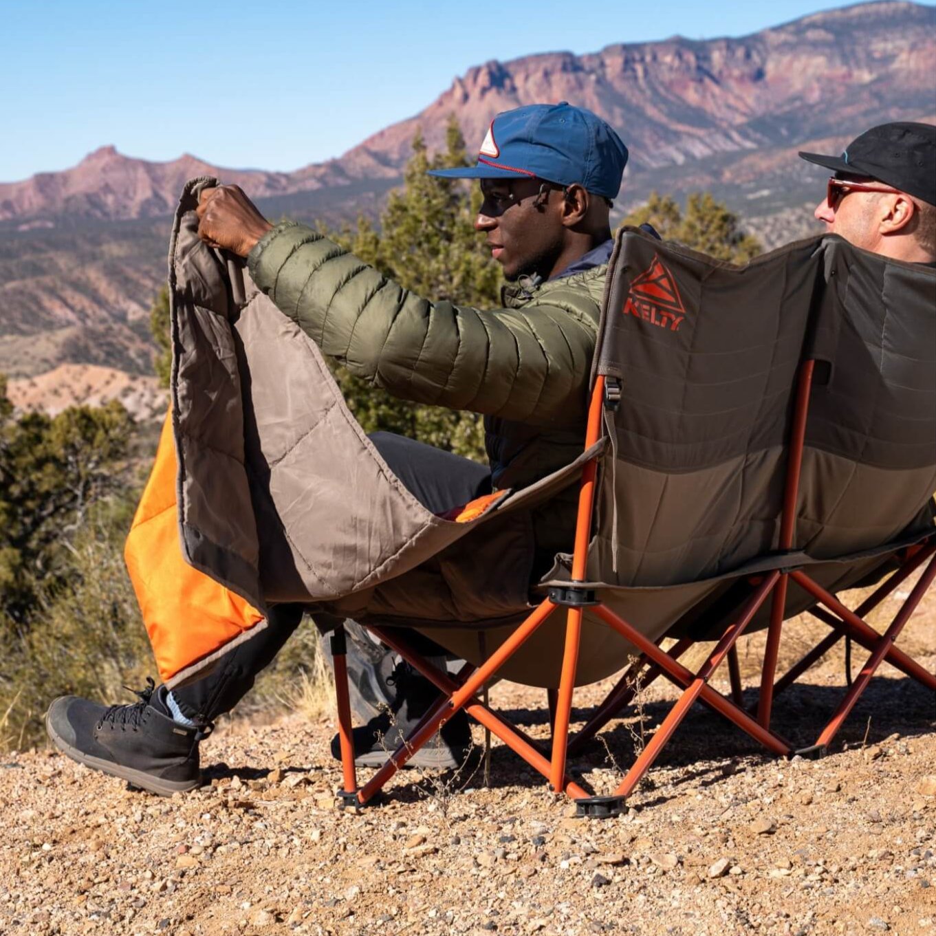 outdoor loveseat chair with two men