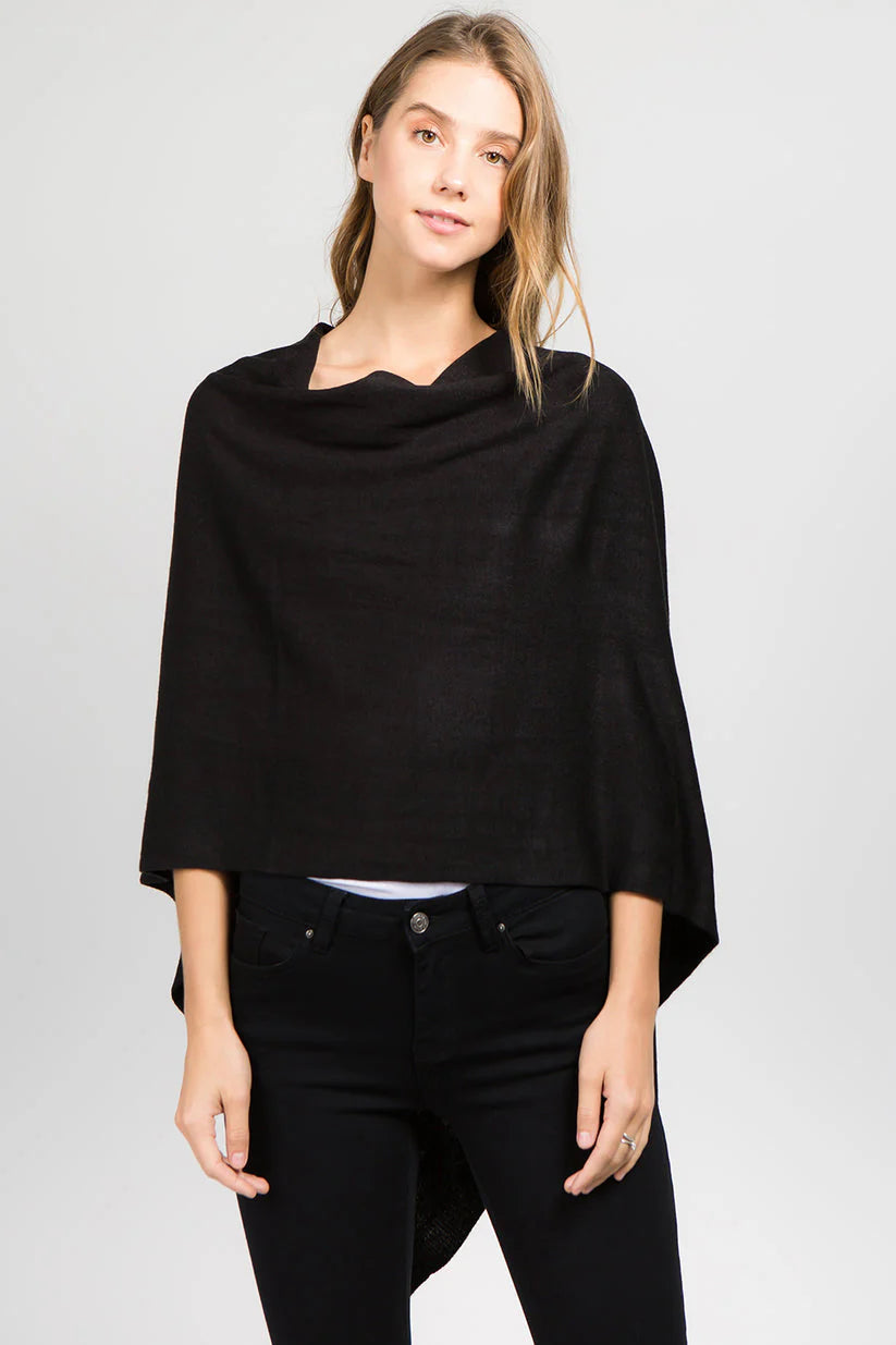 Black poncho on model