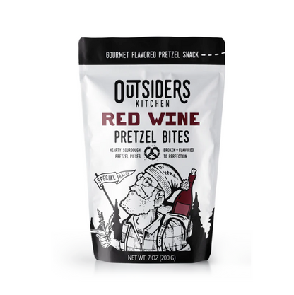 bag of pretzels depicting hiker carrying red wine